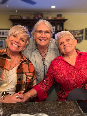 Linda (right) with her sisters Barb (left) and Ruth (middle).
