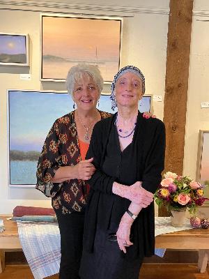 Mary Sipp Green at her art opening with her sister, Gloria Henry